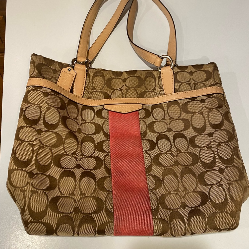Coach purse with beautiful pink stripe